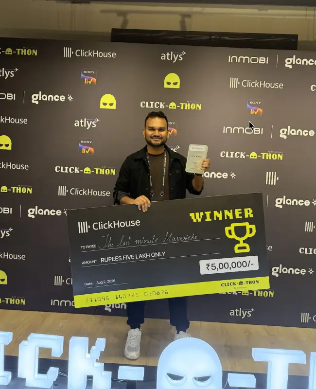 Deepak holding the ClickHouse Clickathon winner cheque